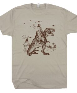 Jesus Riding Dinosaur T Shirt Funny T Shirts for Men Women UFO T Shirt Offensive Shirt Cool Graphic T Shirts Crazy Shirts T Rex Novelty Tee