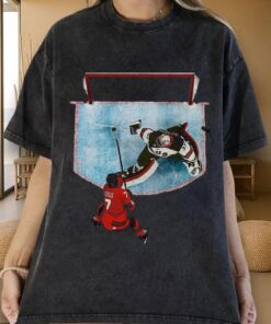 Connor Hellebuyck Goalie Save USA Gold T-shirt, A Classic Sports Gift for fans featuring a hockey goalkeeper